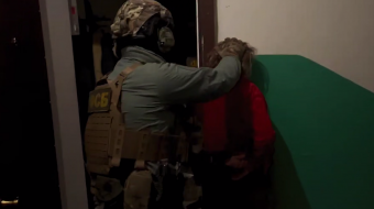 Задержание жительницы оккупированного Донецка. Фото: кадр из видео